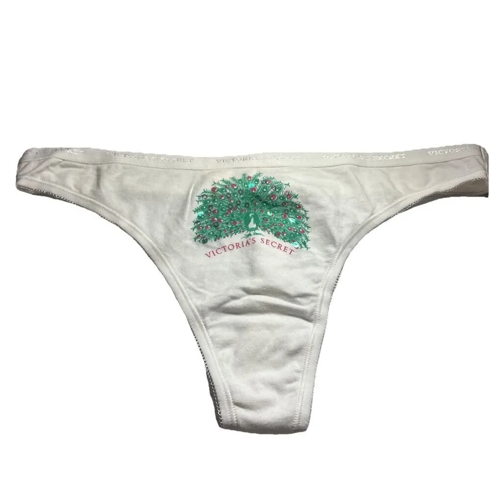 VTG. Victoria Secret white with Peacock image Thong Size LG. NEW Cotton